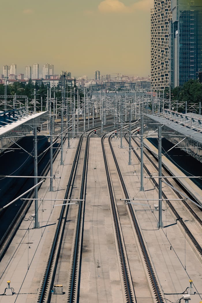 Aerial view of a modern train station with multiple tracks in Ankara, Türkiye.